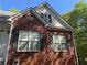 Exterior of house needing TLC at 384 Daniel Mill Xing, Villa Rica, GA 30180
