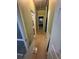 Hallway featuring neutral carpet and light green walls providing continuity throughout living spaces at 384 Daniel Mill Xing, Villa Rica, GA 30180