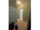 Hallway with a door to a bathroom with a shower/tub combo at 384 Daniel Mill Xing, Villa Rica, GA 30180
