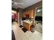 Efficient kitchen with neutral backsplash, wood cabinets, double sinks, and modern appliances at 384 Daniel Mill Xing, Villa Rica, GA 30180