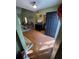 View of the Living Room from the upper floor, featuring hard wood flooring at 384 Daniel Mill Xing, Villa Rica, GA 30180
