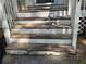 Close-up of porch steps in need of repair at 384 Daniel Mill Xing, Villa Rica, GA 30180
