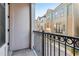 Balcony with black iron railings and views of the neighborhood and other homes at 621 Broadview Ne Ter, Atlanta, GA 30324