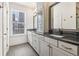 Bathroom featuring granite countertops and white cabinets at 621 Broadview Ne Ter, Atlanta, GA 30324