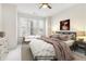 This staged bedroom features natural light, neutral colors, and stylish furnishings for a peaceful retreat at 621 Broadview Ne Ter, Atlanta, GA 30324