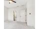 Bright bedroom with a ceiling fan and an open door to the hallway at 621 Broadview Ne Ter, Atlanta, GA 30324