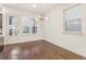 Dining area with hardwood floors, modern light fixture, and a door to the outside at 621 Broadview Ne Ter, Atlanta, GA 30324