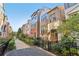 Beautiful townhome showcasing brick facade and lush landscaping along a paved walkway at 621 Broadview Ne Ter, Atlanta, GA 30324