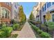 A well-maintained walkway lined with manicured shrubs leading through the neighborhood at 621 Broadview Ne Ter, Atlanta, GA 30324