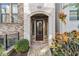 Charming front entrance with a stone archway and brick detailing at 621 Broadview Ne Ter, Atlanta, GA 30324