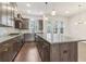 Bright kitchen with a large island, stainless steel appliances, and modern lighting at 621 Broadview Ne Ter, Atlanta, GA 30324