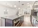 Open kitchen view with modern appliances and an island that integrates into the living area at 621 Broadview Ne Ter, Atlanta, GA 30324
