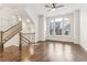 Bright living room with hardwood floors and large windows providing ample natural light at 621 Broadview Ne Ter, Atlanta, GA 30324