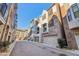 Street view of townhomes features brick accents, two-car garages, and inviting curb appeal at 621 Broadview Ne Ter, Atlanta, GA 30324