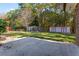 The backyard has a large grass area, a shed and screened structure at 6418 Briarwood Ct, Riverdale, GA 30296