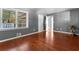 Bedroom boasts hardwood floors and natural light at 6418 Briarwood Ct, Riverdale, GA 30296