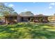 This home has a well-manicured lawn and a brick exterior at 6418 Briarwood Ct, Riverdale, GA 30296