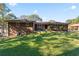 The brick exterior of the house is well-maintained, with a lush green lawn in front at 6418 Briarwood Ct, Riverdale, GA 30296