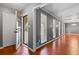 Inviting living room featuring hardwood floors, fresh paint, and plenty of natural light at 6418 Briarwood Ct, Riverdale, GA 30296