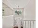 Bright foyer with tall windows, a view of the front yard, and white trim at 2240 Creekside Vw, Decatur, GA 30035