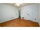 The bedroom boasts hardwood floors, neutral walls, two closets, and two windows, creating a cozy atmosphere at 4324 Japonica Sw Ct, Lilburn, GA 30047