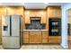Kitchen with stainless steel appliances, granite countertops, tile backsplash and tile floor at 4324 Japonica Sw Ct, Lilburn, GA 30047