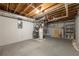 Unfinished basement features basic utilities and ample space for storage or future customization at 4408 Brandon Ne Ct, Marietta, GA 30066