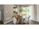 Cozy dining space with a view of the backyard, seating for four, and modern decor at 4408 Brandon Ne Ct, Marietta, GA 30066