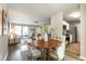 Bright dining area open to the living room and kitchen featuring stylish chairs and wooden table at 4408 Brandon Ne Ct, Marietta, GA 30066