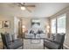 Bright living room showcasing contemporary decor, large windows, and comfortable seating at 4408 Brandon Ne Ct, Marietta, GA 30066
