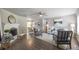 Inviting living room features a fireplace, stylish furnishings, and wood-look flooring at 4408 Brandon Ne Ct, Marietta, GA 30066