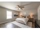 Bright main bedroom features hardwood floors, neutral walls, and a ceiling fan at 4408 Brandon Ne Ct, Marietta, GA 30066