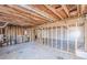Spacious unfinished basement featuring exposed beams and ample potential for customization at 143 Longview Rd, Fayetteville, GA 30214