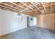 Partially finished basement featuring an unfinished ceiling and cement floors ready for flooring at 143 Longview Rd, Fayetteville, GA 30214