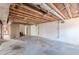 Spacious unfinished basement with concrete floor and exposed ductwork is ready for customization at 143 Longview Rd, Fayetteville, GA 30214