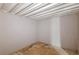 Unfinished basement corner with concrete walls and ceiling, offering a blank canvas for customization at 143 Longview Rd, Fayetteville, GA 30214
