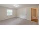 Cozy bedroom featuring carpet and closet space at 143 Longview Rd, Fayetteville, GA 30214