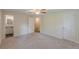 Bright bedroom with carpet and doors leading to a bathroom and another room at 143 Longview Rd, Fayetteville, GA 30214