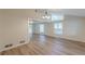 Bright living room with wood floors, neutral walls, and many windows at 143 Longview Rd, Fayetteville, GA 30214