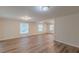 Bright living room with wood flooring, multiple windows, and natural light at 143 Longview Rd, Fayetteville, GA 30214