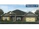 Charming single-story home with a symmetrical design, features a brick facade, a two-car garage, and a well-manicured lawn at 348 Charles Ridge #54, Dallas, GA 30157