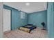 Cozy bedroom with tiled floors and a window, offering a comfortable and private retreat at 4002 Phylis Pl, Decatur, GA 30035