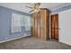 Comfortable bedroom with closet space, a ceiling fan, and neutral walls at 4002 Phylis Pl, Decatur, GA 30035