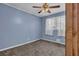 Bedroom with a ceiling fan, neutral wall, and wall-to-wall carpeting at 4002 Phylis Pl, Decatur, GA 30035
