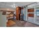 Pantry with wooden shelves, cabinets, and access to the exterior of the home at 4002 Phylis Pl, Decatur, GA 30035