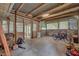 Covered patio featuring a concrete floor, ample space, and natural light, ideal for outdoor projects or relaxation at 4002 Phylis Pl, Decatur, GA 30035