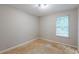 Bedroom with bare floors and natural light from window at 5856 Rock Rd, Union City, GA 30291