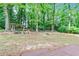 Backyard features a covered picnic area and fire pit at 604 Continental Dr, Lawrenceville, GA 30044