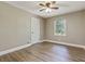 A room with light-colored walls and hardwood floors at 604 Continental Dr, Lawrenceville, GA 30044
