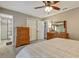 Bedroom with an ensuite bathroom and neutral color palette at 604 Continental Dr, Lawrenceville, GA 30044